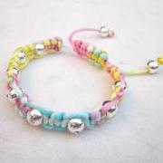 Rainbow friendship bracelet with silver beads macrame